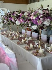 HIRE ONLY PURPLE PINK CENTREPIECES. Text 07450338825 to receive a quote.