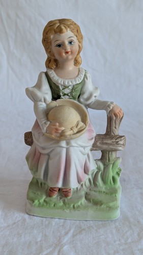 Small young girl sitting a - small,