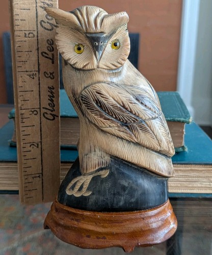 Hand carved buffalo horn owl - hand,