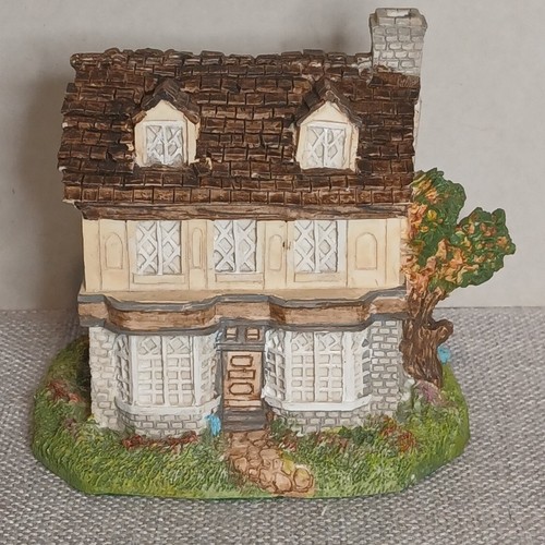 Hand painted resin cottage - hand,