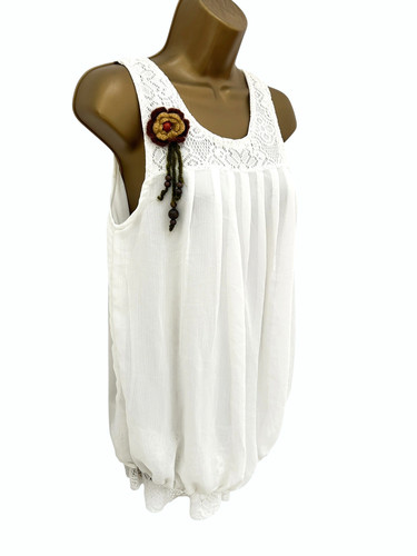 Sleeveless cream top approx - sleeveless,