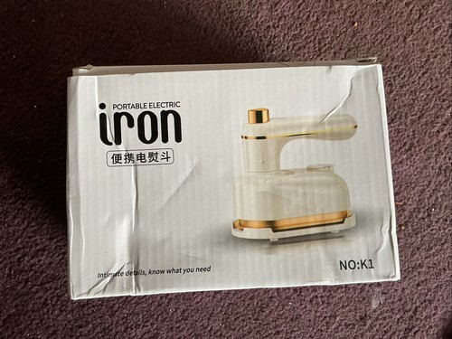 Travelling steam iron 1 - travelling,