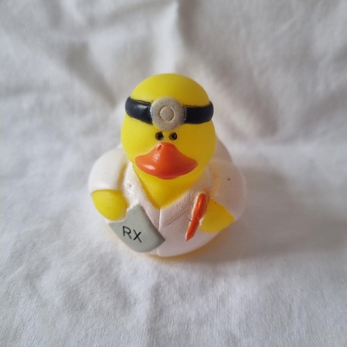 Yellow rubber duck - rubber,