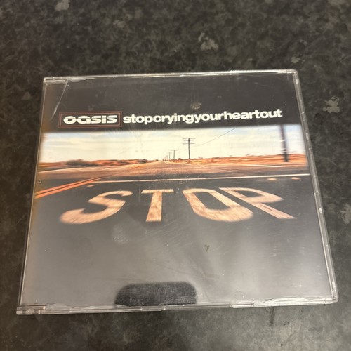 Oasis stop crying your - -, heart