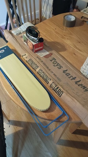 Vintage ironing board and iron - and,