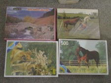 FOUR 500 PIECE  JIG SAW