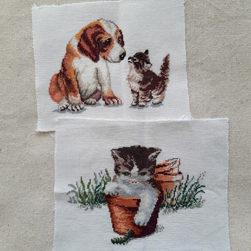 Two finished cross stitch - cross,