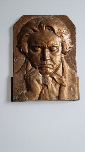 Bronze plate carved character - carved,