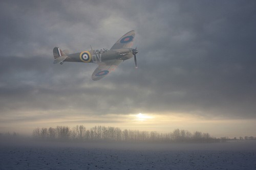 Spitfire mk1a over - , fields