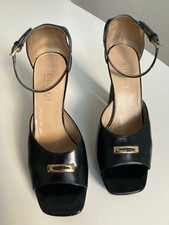 Black Gucci Platform Shoes, With Gold Gucci Buckle, used VGC. size EU37 