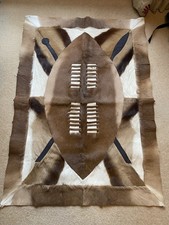  Animal Skin wall hanging Rug, with an African Shield centre piece  