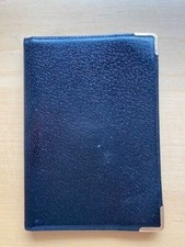 Smythson black leather passport cover with 14 Ct gold rolled corners