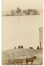 Horse drawn wagon Men Seated