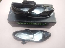 SCHUH BUTTON BAR BLACK PATENT