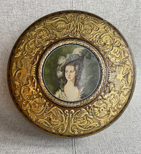 Vintage circular Huntley & Palmer tin with elegant woman, embossed detail, 1950s