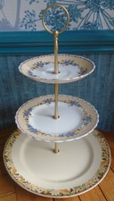 3 tier cake stand Part mismatched cream & multi colured floral plates