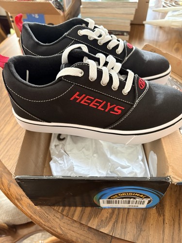 Brand new box heelys red - in,