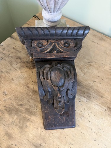 Dark wooden hand - , carved