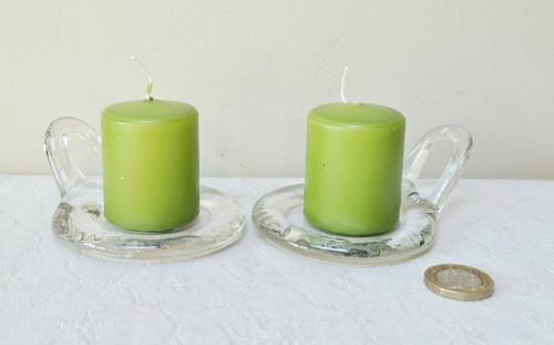 Two glass candle holders
