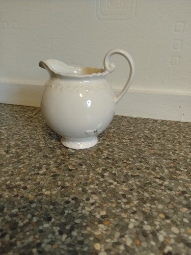 White ceramic creamer milk - white,
