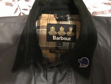 Hedgehog Metal pin badge. Metal Enamel Brooch,Blue,displayed on Barbour jacket