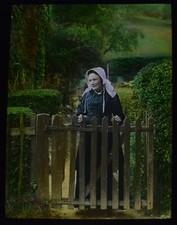 OLD EDWARDIAN LADY AT THE GATE