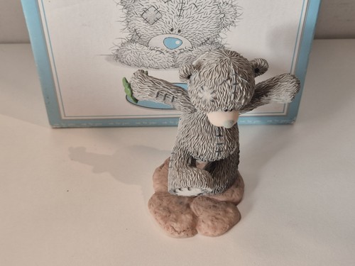 You bear figurine - to,