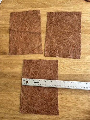 Pack tan leather pieces - of,