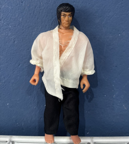 Bruce lee figure - by, largo