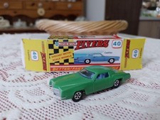 LONE STAR FLYERS 1970's DIECAST GREEN CADILLAC WITH GOOD BOX.