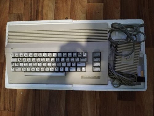 Commodore c64c with psu - commodore,