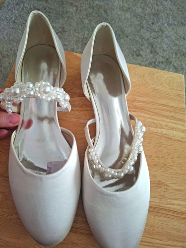 Never worn ivory - worn, low