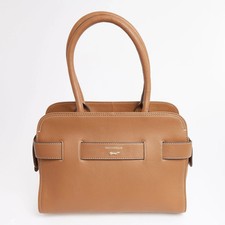 Paul Costelloe Brown Logo