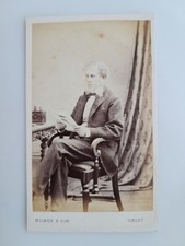 CDV: Man Chair Reading: J