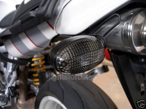 Smoked indicator signal lenses