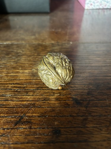 Cast bronze walnut ring case - cast,