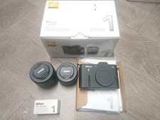 Nikon 1 V1  10-30mm + 30-110mm