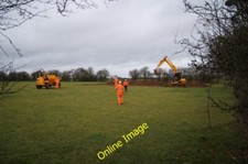 Photo 6x4 Five men in orange East Oakley No idea what they are up to, no  c2014