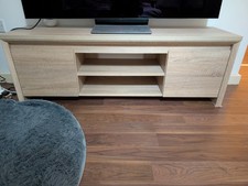 Light oak TV stand. Excellent condition, solid and tidy