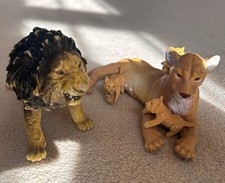 Lioness with Cubs and Lion