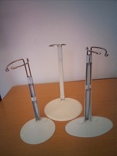 Adjustable White Metal Doll