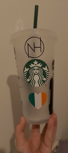 Starbucks cup with - , straw