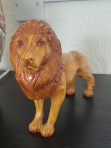 Hand carved lion - hand, wooden