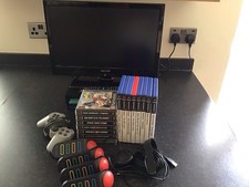 PlayStation 2 Bundle Including TV, Buzzers & Games