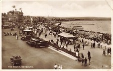 RPPC the front Weymouth busy scene cars beach huts prom corner creases 0688