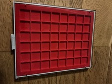 A LINDNER COIN STACKING TRAY