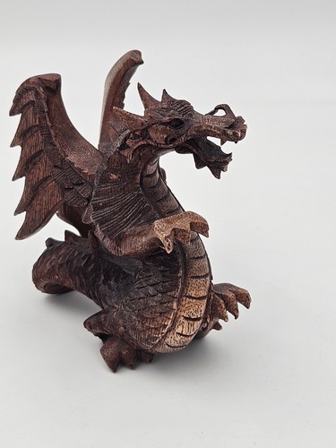 Hand carved wooden dragon - hand,