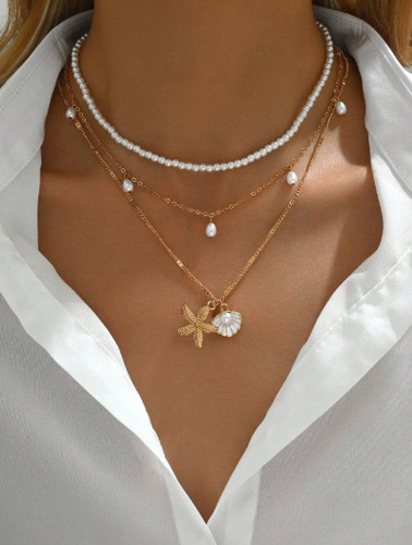 Faux pearl shell - conch, tassel