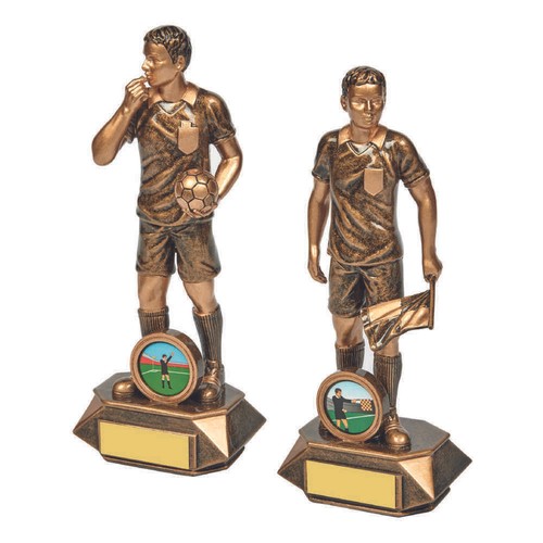 Referee and assistant - and,