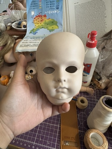 Antique style bisque doll - bisque,